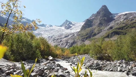 A Creek with mountains in the background Video stock 145050166