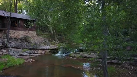 Creek side cabin Stock Footage 80044131