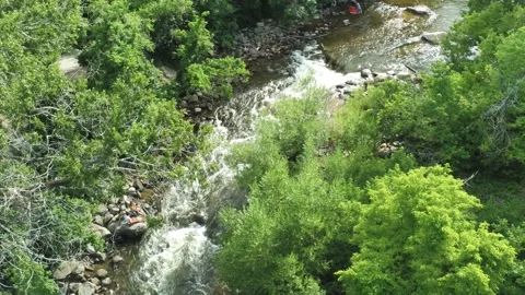 Creek in Summer - Drone camera moves down and left Stock Footage 134833808