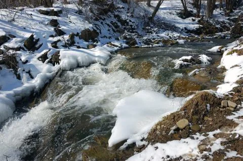 Creek in winter Stock Photos