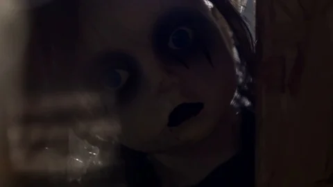 Creeping doll in the dark Stock-Footage 128090840