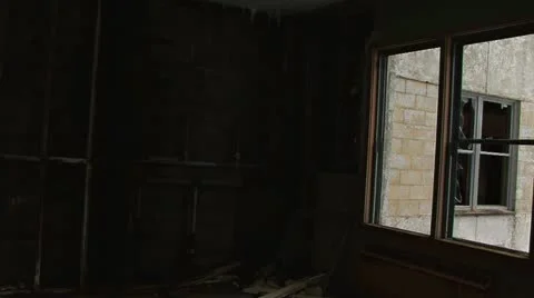 Creeping Past Broken Windows in Scary Old Ruin Look Out Stock Footage 12363833