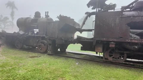 Creepy Abandoned Steam Train Graveyard in Foggy Weather, Brazil Stock Footage 335400581