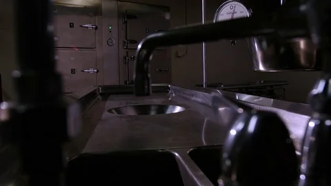 CREEPY AUTOPSY TABLE.  4K SLIDER SHOT.  NO PEOPLE. Stock-Footage 73100367