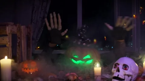 Creepy background with dancing skeleton hands pumpkin, festive halloween. Stock Footage 252413167