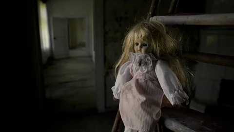 Creepy Doll In An Abandoned House. Halloween. Horror Movie. Stock Photo,  Picture and Royalty Free Image. Image 200802279.