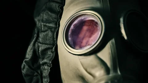 Creepy gas mask with mysterious eyes. Ex... | Stock Video | Pond5