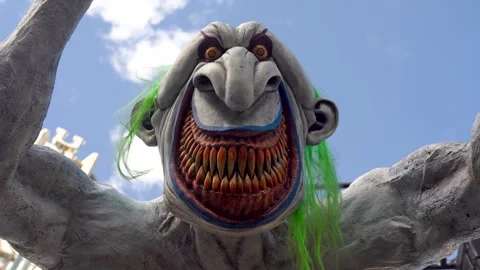 Creepy giant monster clown with sharp teeth Halloween statue Stock Footage 319517772