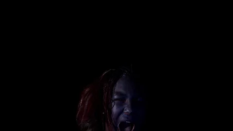 Creepy kid at bottom of the screen screaming Stock Footage 123098140