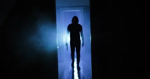 Creepy Man In Strobe Lights Attacks With Knife Video stock 161599845