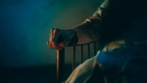 Creepy old witch ghost sitting in armchair at haunted house, halloween nightmare Stock Footage 260069299