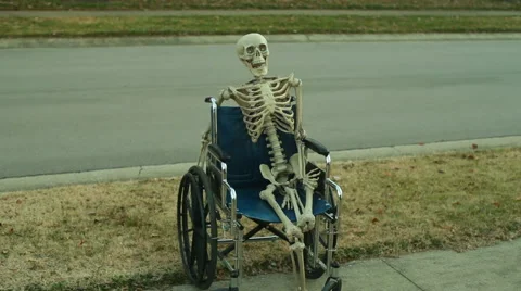 creepy skeleton in wheelchair | Stock Video | Pond5