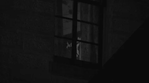 A creepy window of a haunted house | Stock Video | Pond5