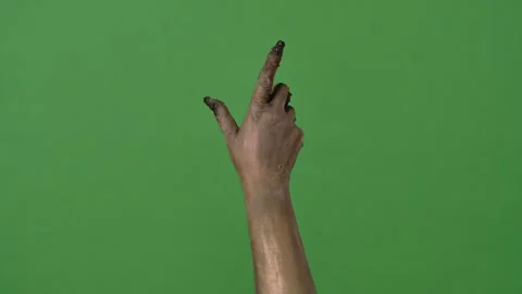 Creepy zombie hands take something from the screen Stock Footage 318309990