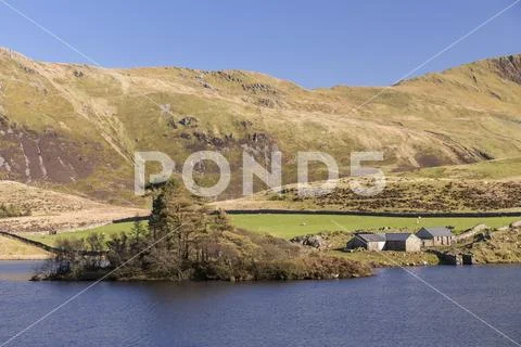 Cregennan Lakes farm, Snowdonia, Wales, on a clear, sunny day Stock Photos