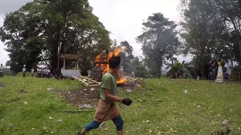 Cremation process is almost complete Bali Indonesia Stock Footage 119800563