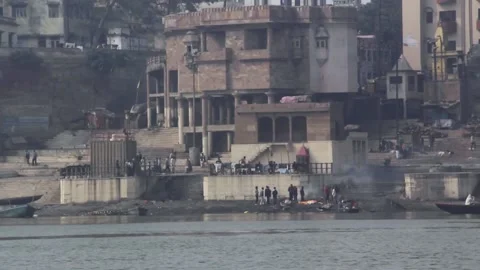 Cremations On The Ganges River In Varanasi, India Stock Footage 159174961