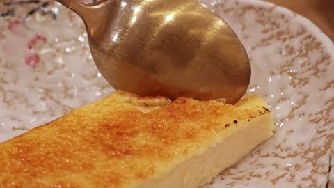 Crème brûlée burning sugar serving. Stock Footage 307592796