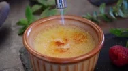 Creme Brulee Finishing By Chef, Sugar And Torch Stock Footage