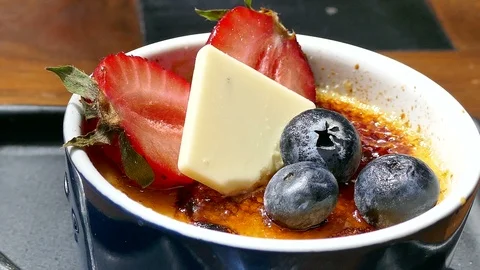 Creme brulee with strawberries Stock Footage 89623346