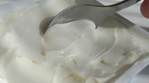 Creme cheese tasting from the plastic box 4K footage Stock Footage 90800756