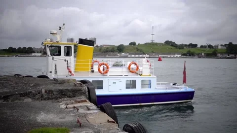 Cremyll ferry working between Mount Edgcumbe Cornwall and Plymouth Devon England Stock Footage 134568331