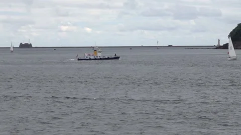 Cremyll ferry working between Mount Edgcumbe Cornwall and Plymouth Devon England Stock Footage 136671503