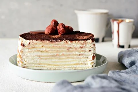 Crepe cake made of thin Crepe with butter cream, cocoa, chocolate Stock Photos