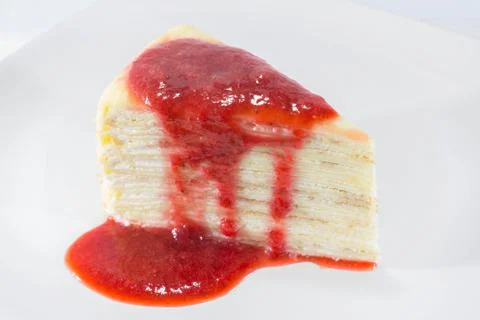 Crepe Cake with strawberry source Foto stock