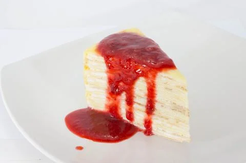 Crepe Cake with strawberry source Foto stock