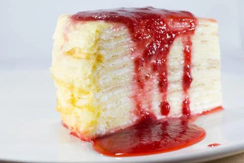 Crepe Cake with strawberry source Foto stock