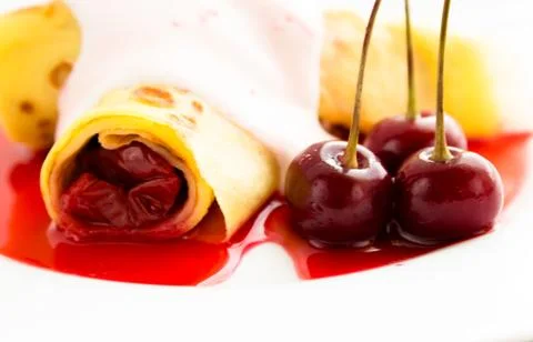 Crepe pancake with cherry Stock Photos