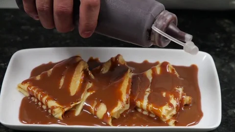 Crepes with caramel Stock Footage 84833014