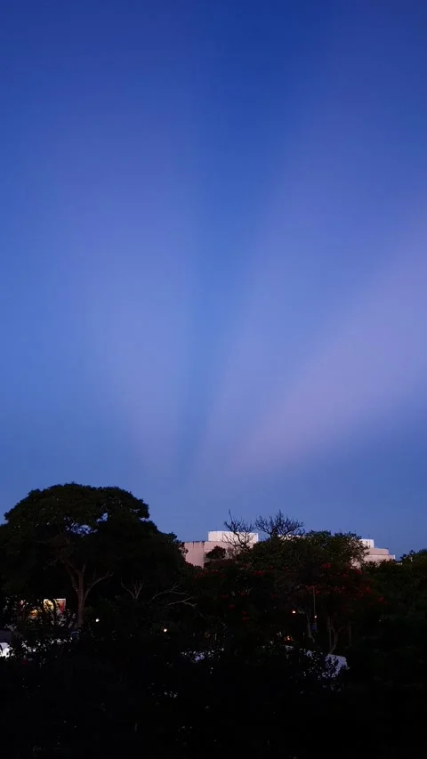 Crepuscular rays or God light during blue hour/sunset Stock Footage 305925000