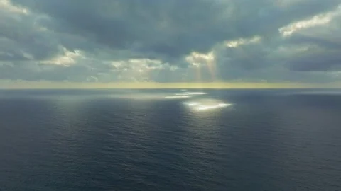 Crepuscular rays or "God rays" over the sea, drone Stock Footage 329373377