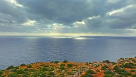 Crepuscular rays or "God rays" over the sea Stock Footage 329373437