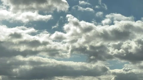 Crepuscular sun rays breaking through warm afternoon clouds Stock Footage 343070103