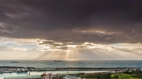 Crepuscular sun rays during sunset over the sea Stock-Footage 65154949