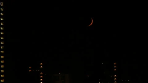Crescent between lights of windows Stock Footage 130604721