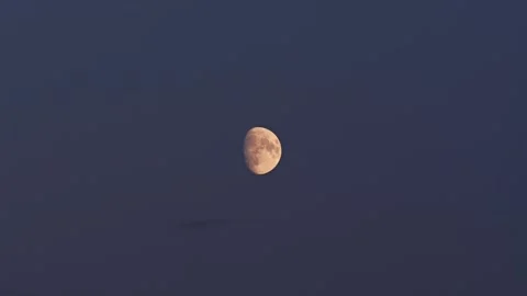 Crescent Moon Against a Clear Deep Blue Night Sky 스톡 동영상 316331789