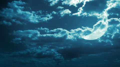 Crescent moon behind fast moving clouds. Stock Footage 44559575