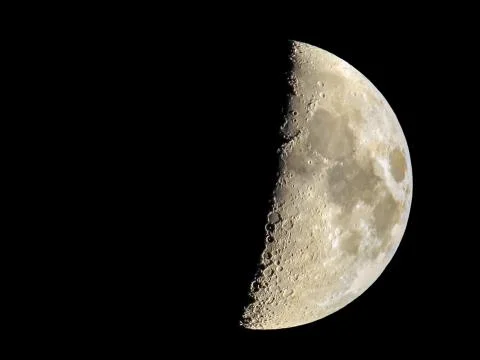 Crescent moon on black background Stock Photos