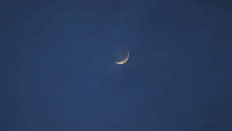 Crescent moon in blue sky Stock Footage 90475490
