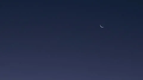Crescent Moon in Clear Twilight Sky Stock Footage 282933310