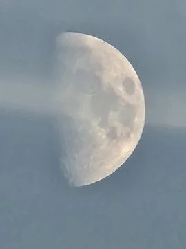 Crescent Moon with Clouds in Twilight Sky Stock Photos