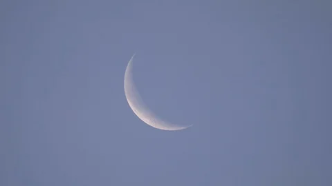 Crescent Moon in the Daytime Blue Sky Stock Footage 109656033