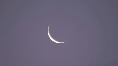 Crescent Moon in the Daytime Blue Sky Stock Footage 109656185