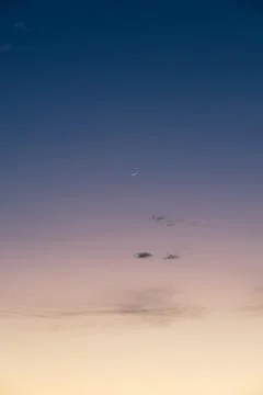 Crescent moon at Dusk Stock Photos