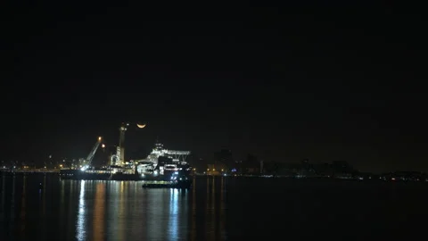 Crescent Moon Illuminating Ship Stock Footage 136033938