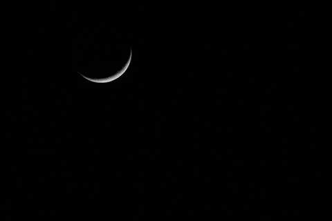 Crescent moon on the left Fotos Stock